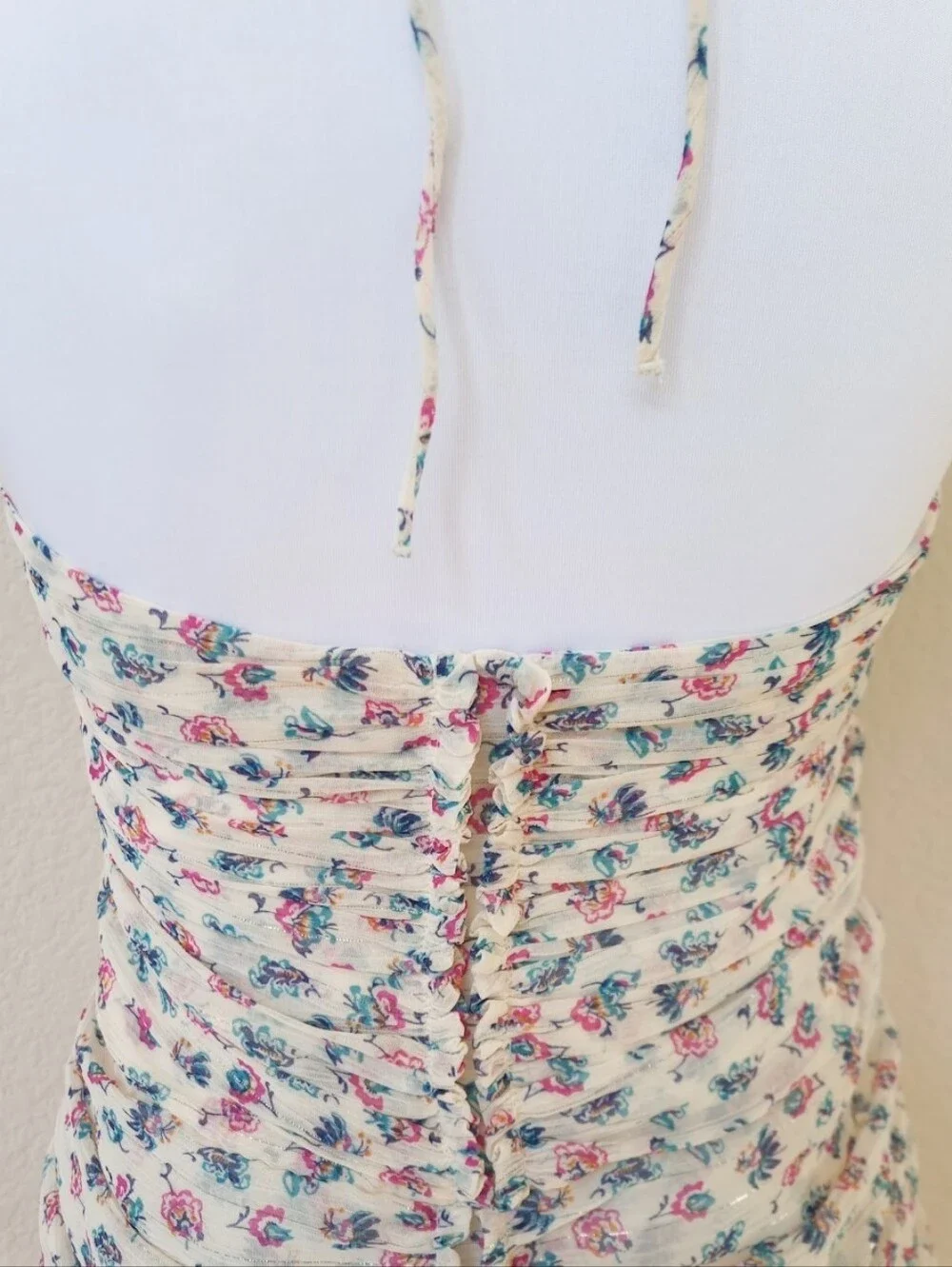 Zara cream ruched halter mini dress with subtle floral and metallic accents